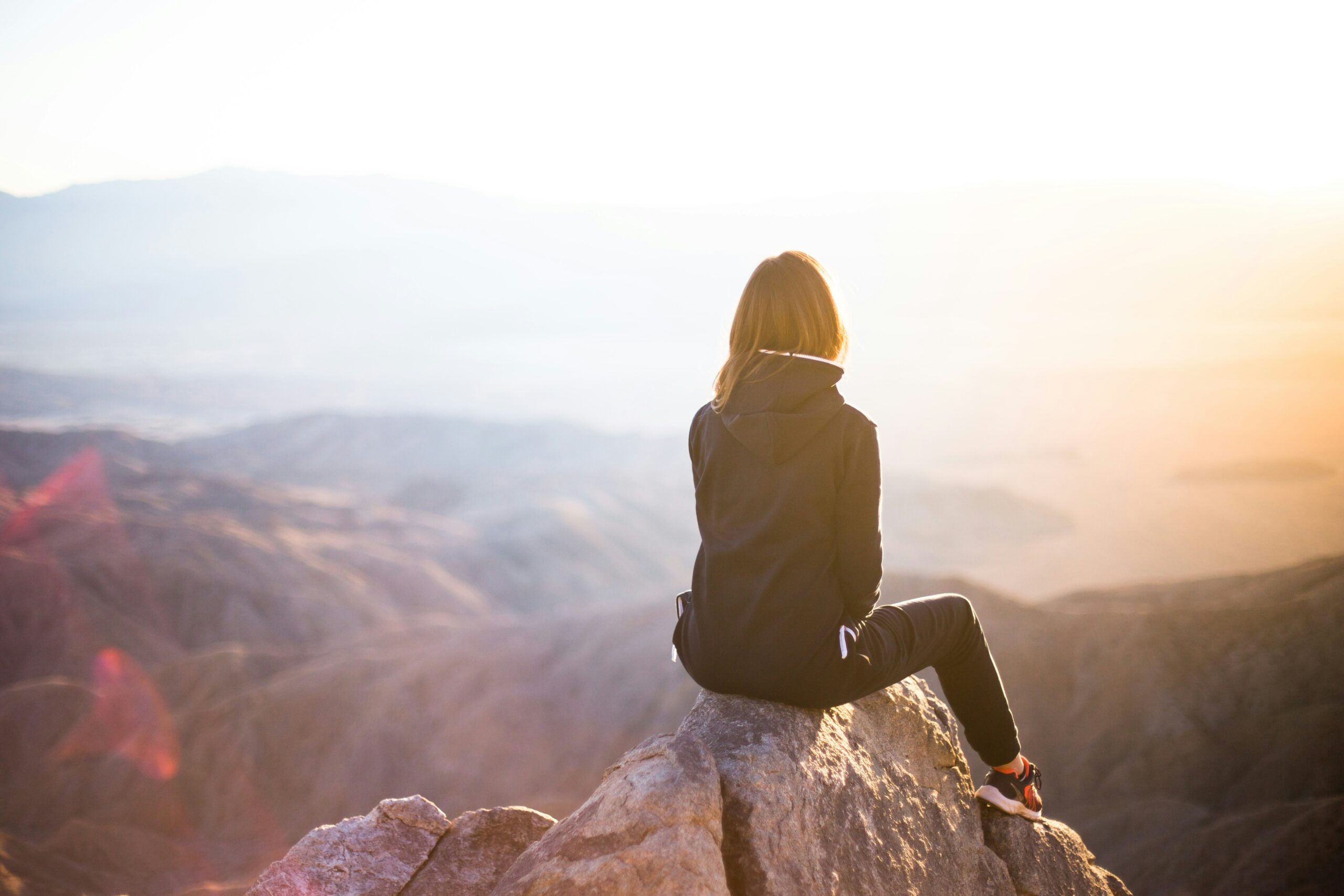 Person overlooking a mountain landscape